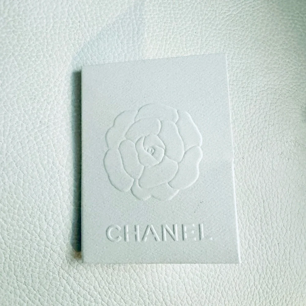 Chanel Receipt holders in camelia and black and an envelope